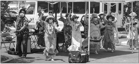 Hula club performs again for friends outside LW