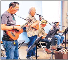 Hula club dances to its own band