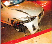 Suspected drunk driver crashes through block wall