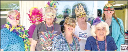 RSVP now for the Woman’s Club Mardi Gras fundraiser