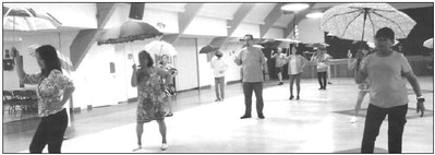 DANCING FEET CLUB 
	The/Dancing/Feet/Club/dancers/are/warming/up/for/their/performance/of/"Umbrella"/ and/"Cha/Cha/Twist"/line/dances/this/Sunday,/AugW/e5,/at/the/club&apos;s/social/ballroom/ ….