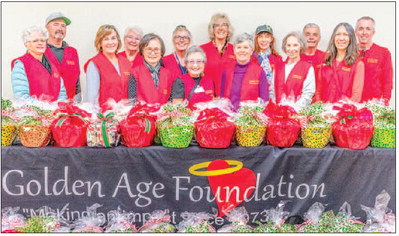 GAF volunteers pack gift baskets for residents